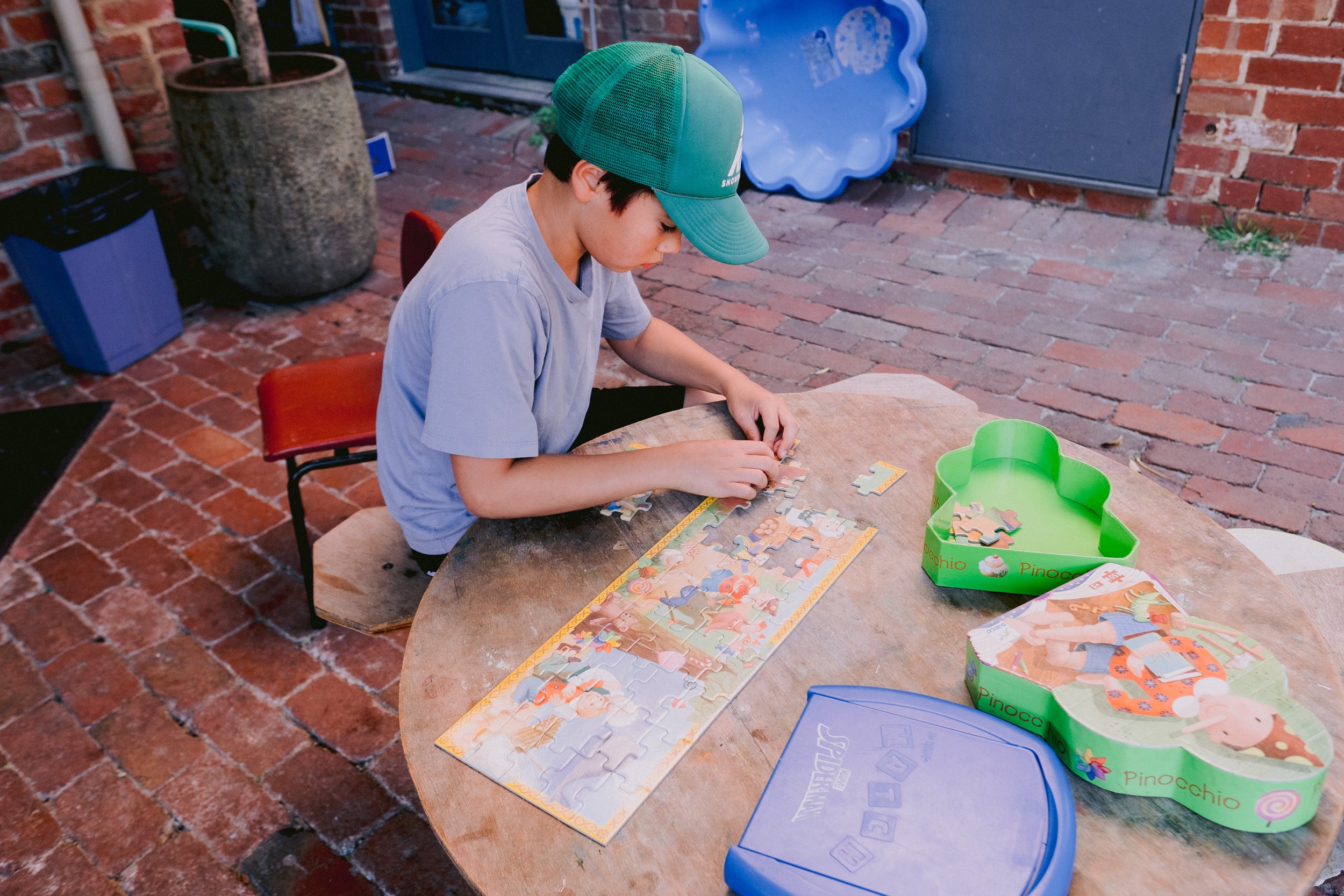 Boy doing jigsaw