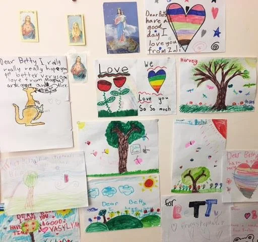 Kids cards on Betty's wall